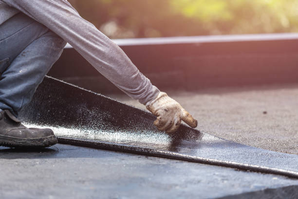 Professional Basement Waterproofing technician working in Vienna, IL